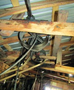 pulleys hanging from the ceiling.